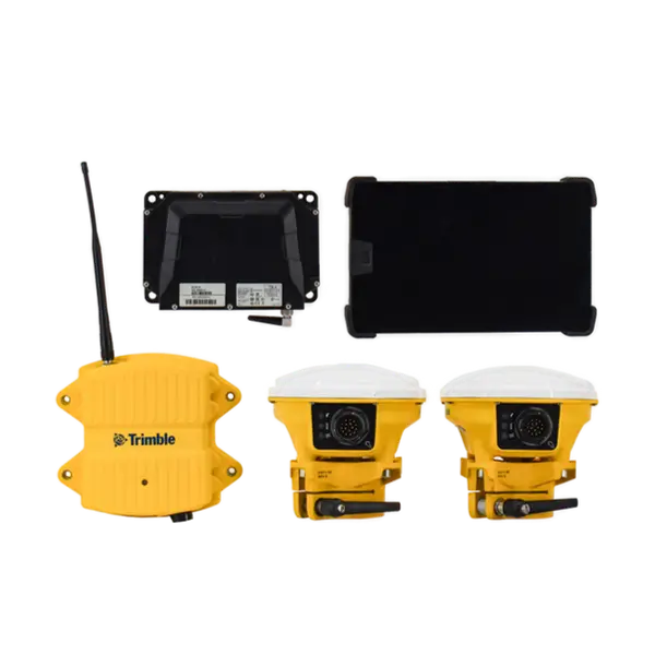 Trimble surveying equipment set including two yellow GPS receivers, a wireless module, a control panel, and a rugged tablet, all laid out on a white background. AdvanceTrac
